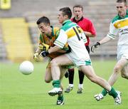29 July 2006; Eoin Wade, Donegal, in action against Ken Casey, Offaly. ESB All-Ireland Minor Football Championship Quarter-Final, Donegal v Offaly, St Tighearnach's Park Clones, Co. Monaghan. Picture credit; Oliver McVeigh / SPORTSFILE