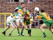 29 July 2006; Mark Mc Gowan, Donegal, in action against Nigel Dunne, Offaly. ESB All-Ireland Minor Football Championship Quarter-Final, Donegal v Offaly, St Tighearnach's Park Clones, Co. Monaghan. Picture credit; Oliver McVeigh / SPORTSFILE