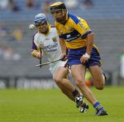 23 July 2006; Tony Griffin, Clare, in action against Malachy Travers, Wexford. Guinness All-Ireland Senior Hurling Championship Quarter-Final, Clare v Wexford, Croke Park, Dublin. Picture credit: Aoife Rice / SPORTSFILE