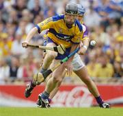 23 July 2006; Niall Gilligan, Clare, in action against Malachy Travers, Wexford. Guinness All-Ireland Senior Hurling Championship Quarter-Final, Clare v Wexford, Croke Park, Dublin. Picture credit: Ray McManus / SPORTSFILE