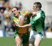 30 July 2006; Barry Owens, Fermanagh, in action against James Gallagher, Donegal. Bank of Ireland All-Ireland Senior Football Championship Qualifier, Round 4, Fermanagh v Donegal, Brewster Park, Enniskillen, Co. Fermanagh. Picture credit; Oliver McVeigh / SPORTSFILE