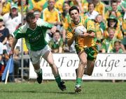 30 July 2006; Hugh Brady, Fermanagh, in action against Michael Hegarty, Donegal. Bank of Ireland All-Ireland Senior Football Championship Qualifier, Round 4, Fermanagh v Donegal, Brewster Park, Enniskillen, Co. Fermanagh. Picture credit; Oliver McVeigh / SPORTSFILE