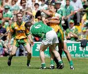 30 July 2006; Hugh Brady and Ryan Mc Cluskey, Fermanagh, in action against Michael Hegarty, Donegal. Bank of Ireland All-Ireland Senior Football Championship Qualifier, Round 4, Fermanagh v Donegal, Brewster Park, Enniskillen, Co. Fermanagh. Picture credit; Oliver McVeigh / SPORTSFILE