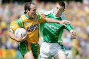30 July 2006; Barry Owens, Fermanagh, in action against James Gallagher, Donegal. Bank of Ireland All-Ireland Senior Football Championship Qualifier, Round 4, Fermanagh v Donegal, Brewster Park, Enniskillen, Co. Fermanagh. Picture credit; Oliver McVeigh / SPORTSFILE