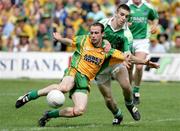 30 July 2006; Barry Owens, Fermanagh, in action against Leon Thompson, Donegal. Bank of Ireland All-Ireland Senior Football Championship Qualifier, Round 4, Fermanagh v Donegal, Brewster Park, Enniskillen, Co. Fermanagh. Picture credit; Oliver McVeigh / SPORTSFILE