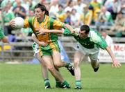 30 July 2006; Christy Toye, Donegal, in action against Raymond Johnston, Fermanagh. Bank of Ireland All-Ireland Senior Football Championship Qualifier, Round 4, Fermanagh v Donegal, Brewster Park, Enniskillen, Co. Fermanagh. Picture credit; Oliver McVeigh / SPORTSFILE