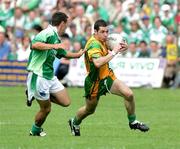 30 July 2006; James Sherry, Fermanagh, in action against Barry Dunnion, Donegal. Bank of Ireland All-Ireland Senior Football Championship Qualifier, Round 4, Fermanagh v Donegal, Brewster Park, Enniskillen, Co. Fermanagh. Picture credit; Oliver McVeigh / SPORTSFILE