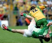 30 July 2006; Eamon Maguire, Fermanagh, in a tackle against Ciaran Bonner, Donegal which ended in a suspected broken Jaw. Bank of Ireland All-Ireland Senior Football Championship Qualifier, Round 4, Fermanagh v Donegal, Brewster Park, Enniskillen, Co. Fermanagh. Picture credit; Oliver McVeigh / SPORTSFILE