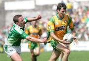 30 July 2006; Christy Toye, Donegal, in action against Shane Mc Dermott, Fermanagh. Bank of Ireland All-Ireland Senior Football Championship Qualifier, Round 4, Fermanagh v Donegal, Brewster Park, Enniskillen, Co. Fermanagh. Picture credit; Oliver McVeigh / SPORTSFILE