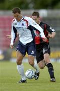 30 July 2006; Graham Gartland, Drogheda United, in action against Robbie Martin, Longford Town. eircom League, Premier Division, Longford Town v Drogheda United, Flancare Park, Longford. Picture credit; David Maher / SPORTSFILE