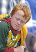 30 July 2006; A young Offaly fan shows his dejection in the dying moments of the match. Bank of Ireland All-Ireland Senior Football Championship Qualifier, Round 4, Laois v Offaly, O'Moore Park, Portlaoise, Co. Laois. Picture credit; Brian Lawless / SPORTSFILE