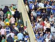 30 July 2006; Laois fans watch the end of the match as Offaly fans begin to make their way from the ground. Bank of Ireland All-Ireland Senior Football Championship Qualifier, Round 4, Laois v Offaly, O'Moore Park, Portlaoise, Co. Laois. Picture credit; Brian Lawless / SPORTSFILE