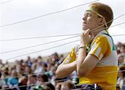 30 July 2006; A young Offaly fan watches on during the match. Bank of Ireland All-Ireland Senior Football Championship Qualifier, Round 4, Laois v Offaly, O'Moore Park, Portlaoise, Co. Laois. Picture credit; Brian Lawless / SPORTSFILE