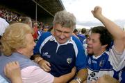 30 July 2006; Laois manager Mick O'Dwyer is congratulated by Laois supporters at the end of the match. Bank of Ireland All-Ireland Senior Football Championship Qualifier, Round 4, Laois v Offaly, O'Moore Park, Portlaoise, Co. Laois. Picture credit; Damien Eagers / SPORTSFILE