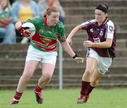 30 July 2006; Yvonne Byrne, Mayo, in action against Geraldine Connely, Galway. TG4 Ladies Connacht Senior Football Final, Mayo v Galway, McHale Park, Castlebar, Co. Mayo. Picture credit; Ray Ryan / SPORTSFILE