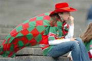 30 July 2006; A Mayo supporter watches the game. TG4 Ladies Connacht Senior Football Final, Mayo v Galway, McHale Park, Castlebar, Co. Mayo. Picture credit; Ray Ryan / SPORTSFILE