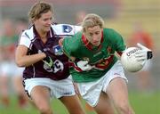 30 July 2006; Cora Staunton, Mayo, in action against Aoibheann Daly, Galway. TG4 Ladies Connacht Senior Football Final, Mayo v Galway, McHale Park, Castlebar, Co. Mayo. Picture credit; Ray Ryan / SPORTSFILE