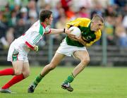 30 July 2006; Michael Moloney, Kerry, in action against Michael Sweeney, Mayo. ESB All-Ireland Minor Football Championship Quarter-Final, Kerry v Mayo, Cusack Park, Ennis, Co. Clare. Picture credit; Kieran Clancy / SPORTSFILE