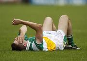 30 July 2006; Karol Slattery, Offaly, lies on the ground after receiving an injury. Bank of Ireland All-Ireland Senior Football Championship Qualifier, Round 4, Laois v Offaly, O'Moore Park, Portlaoise, Co. Laois. Picture credit; Damien Eagers / SPORTSFILE