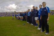 30 July 2006; Laois manager Mick O'Dwyer, right, and the Laois squad stand for the National Anthem before the game. Bank of Ireland All-Ireland Senior Football Championship Qualifier, Round 4, Laois v Offaly, O'Moore Park, Portlaoise, Co. Laois. Picture credit; Brian Lawless / SPORTSFILE