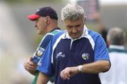 30 July 2006; Laois manager Mick O'Dwyer checks his watch toward the end of the match. Bank of Ireland All-Ireland Senior Football Championship Qualifier, Round 4, Laois v Offaly, O'Moore Park, Portlaoise, Co. Laois. Picture credit; Brian Lawless / SPORTSFILE
