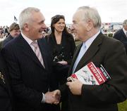 1 August 2006; An Taoiseach Bertie Ahern, T.D., congratulates former Taoiseach Albert Reynolds after his horse Sorry Al won the McDonogh Properties Steeplechase. Galway Races, Ballybrit, Co. Galway. Picture credit; Matt Browne / SPORTSFILE