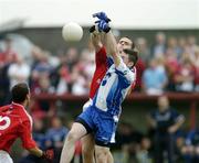 4 August 2006; Keith Sheerin, Monaghan, in action against Shane Lennon, Louth. Tommy Murphy Cup Quarter-Final, Louth v Monaghan, St. Brigid's Park, Dowdallshill, Dundalk, Co. Louth. Picture credit; Matt Browne / SPORTSFILE