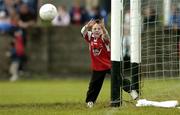 4 August 2006; Five-year-old Barry Dunne, from Dundalk, 'saves a certain goal' during half time game. Tommy Murphy Cup Quarter-Final, Louth v Monaghan, St. Brigid's Park, Dowdallshill, Dundalk, Co. Louth. Picture credit; Matt Browne / SPORTSFILE