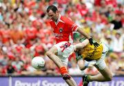 5 August 2006; Steven McDonnell, Armagh, goes round Diarmuid Murphy, Kerry, for his side's 1st half goal. Bank of Ireland All-Ireland Senior Football Championship Quarter-Final, Armagh v Kerry, Croke Park, Dublin. Picture credit; Oliver McVeigh / SPORTSFILE
