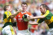 5 August 2006; Ronan Clarke, Armagh, in action against Marc O'Se, left, and Michael McCarthy, Kerry. Bank of Ireland All-Ireland Senior Football Championship Quarter-Final, Armagh v Kerry, Croke Park, Dublin. Picture credit; Damien Eagers / SPORTSFILE