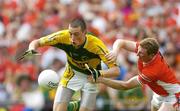 5 August 2006; Kieran Donaghy, Kerry, beats Francie Bellew, Armagh, to score his side's second goal. Bank of Ireland All-Ireland Senior Football Championship Quarter-Final, Armagh v Kerry, Croke Park, Dublin. Picture credit; David Maher / SPORTSFILE