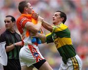 5 August 2006; Paul Galvin, Kerry, tussles with Armagh substitute and water carrier John Toal moments before he was send off. Bank of Ireland All-Ireland Senior Football Championship Quarter-Final, Armagh v Kerry, Croke Park, Dublin. Picture credit; Damien Eagers / SPORTSFILE