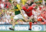 5 August 2006; Darren O'Sullivan, Kerry, goes past Enda Mc Nulty, Armagh, for his 2nd half goal. Bank of Ireland All-Ireland Senior Football Championship Quarter-Final, Armagh v Kerry, Croke Park, Dublin. Picture credit; Oliver McVeigh / SPORTSFILE