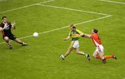 5 August 2006; Darren O'Sullivan, Kerry, goes past Enda McNulty, Armagh, on his way to scoring his side's third goal. Bank of Ireland All-Ireland Senior Football Championship Quarter-Final, Armagh v Kerry, Croke Park, Dublin. Picture credit; Ray McManus / SPORTSFILE