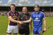 5 July 2014; Clare captain Patrick Donnellan with match referee Cathal McAllister and Wexford captain David McInerney before the game. GAA Hurling All-Ireland Senior Championship, Round 1, Clare v Wexford, Cusack Park, Ennis, Co. Clare. Picture credit: Ray McManus / SPORTSFILE
