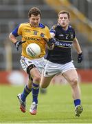 5 July 2014; Aidan Rowan, Longford, in action against Ger Mulhair, Tipperary. GAA Football All Ireland Senior Championship, Round 2A, Tipperary v Longford. Semple Stadium, Thurles, Co. Tipperary. Picture credit: Stephen McCarthy / SPORTSFILE
