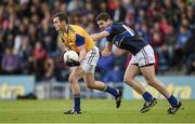 5 July 2014; Fergal Battrim, Longford, in action against Philip Austin, Tipperary. GAA Football All Ireland Senior Championship, Round 2A, Tipperary v Longford. Semple Stadium, Thurles, Co. Tipperary. Picture credit: Stephen McCarthy / SPORTSFILE