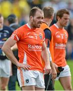 6 July 2014; A dejected Ciaran McKeever, Armagh, leaves the field after the game. Ulster GAA Football Senior Championship, Semi-Final Replay, Armagh v Monaghan, St Tiernach's Park, Clones, Co. Monaghan. Picture credit: Piaras Ó Mídheach / SPORTSFILE