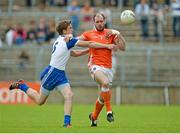 6 July 2014; Ciaran McKeever, Armagh, in action against Dessie Mone, Monaghan. Ulster GAA Football Senior Championship, Semi-Final Replay, Armagh v Monaghan, St Tiernach's Park, Clones, Co. Monaghan. Picture credit: Piaras Ó Mídheach / SPORTSFILE
