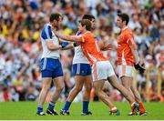 6 July 2014; Monaghan players Vinny Corey, left, and Drew Wylie, become involved in an off the ball tussle with Armagh's Kevin Dyas and Tony Kernan, right. Ulster GAA Football Senior Championship, Semi-Final Replay, Armagh v Monaghan, St Tiernach's Park, Clones, Co. Monaghan. Picture credit: Piaras Ó Mídheach / SPORTSFILE