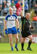 6 July 2014; Dick Clerkin, Monaghan, is shown a yellow card by referee Marty Duffy. Ulster GAA Football Senior Championship, Semi-Final Replay, Armagh v Monaghan, St Tiernach's Park, Clones, Co. Monaghan. Picture credit: Piaras Ó Mídheach / SPORTSFILE