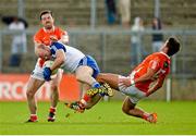 6 July 2014; Dick Clerkin, Monaghan, in action against Aidan Forker, left, and Stefan Campbell, Armagh. Ulster GAA Football Senior Championship, Semi-Final Replay, Armagh v Monaghan, St Tiernach's Park, Clones, Co. Monaghan. Picture credit: Piaras Ó Mídheach / SPORTSFILE