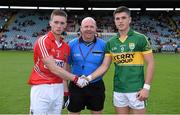 6 July 2014; Team captains Kevin Flahive, Cork, left, and Liam Kearney, Kerry, shake hands in the company of referee Richard Moloney before the game. Electric Ireland Munster GAA Football Minor Championship Final, Cork v Kerry, Páirc Ui Chaoimh, Cork. Picture credit: Brendan Moran / SPORTSFILE