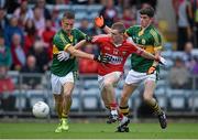6 July 2014; Michael Hurley, Cork, in action against Brian Sugrue, left, and Mark O'Connor, Kerry. Electric Ireland Munster GAA Football Minor Championship Final, Cork v Kerry, Páirc Ui Chaoimh, Cork. Picture credit: Brendan Moran / SPORTSFILE