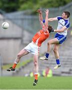 6 July 2014; Kieran Toner, Armagh, in action against Darren Hughes, Monaghan. Ulster GAA Football Senior Championship, Semi-Final Replay, Armagh v Monaghan, St Tiernach's Park, Clones, Co. Monaghan. Picture credit: Ramsey Cardy / SPORTSFILE