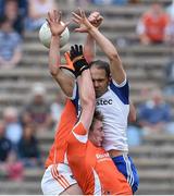 6 July 2014; Paul Finlay, Monaghan, in action against Ciaran McKeever, left, and Kieran Toner, Armagh. Ulster GAA Football Senior Championship, Semi-Final Replay, Armagh v Monaghan, St Tiernach's Park, Clones, Co. Monaghan. Picture credit: Ramsey Cardy / SPORTSFILE