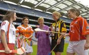 31 July 2006; President of the Camogie Association Liz Howard with All-Ireland U16 captains, from left, Eimear McKenna, Derry, Laura McGuinness, Armagh, Edwina Kean, Kilkenny, and Dawn O’Keeffe, Cork. The Finals take place on Sunday in Naomh Mearnóg, Dublin. The &quot;A&quot; final will be played at 3.30pm, between Cork and Kilkenny, while the &quot;B&quot; Final will be played at 2.00pm, between Armagh and Derry. Croke Park, Dublin. Picture credit; Pat Murphy / SPORTSFILE