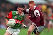 18 July 1999; Alan Dillon of Mayo is tackled by Liam Brady of Galway during the Connacht Minor Football Championship Final match between Mayo and Galway at Tuam Stadium in Tuam, Galway. Photo by Matt Browne/Sportsfile