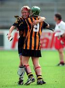 7 August 1999; Kilkenny players Sinéad Millea, 9, and Ann Downey celebrate following the Bórd na Gaeilge All Ireland Senior Camogie Championship Semi-Final match between Cork and Kilkenny at Parnell Park in Dublin. Photo by Ray McManus/Sportsfile