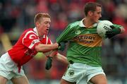 18 July 1999; Colm O'Connor of Kerry in action against Conor McCarthy of Cork during the Munster GAA Football Minor Championship Final match between Cork and Kerry at Páirc Uí Chaoimh in Cork. Photo by Brendan Moran/Sportsfile